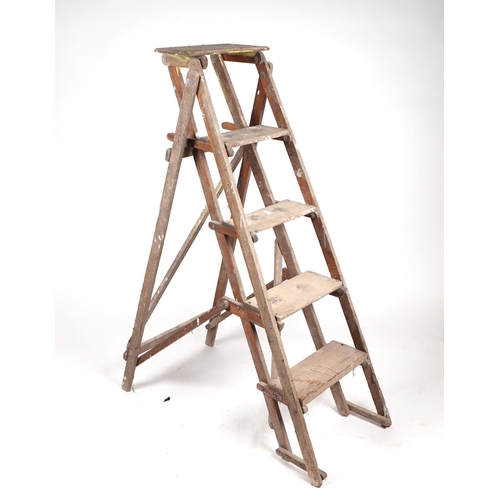 11 - A GPO oak step ladder; together with a rustic barn ladder (2).