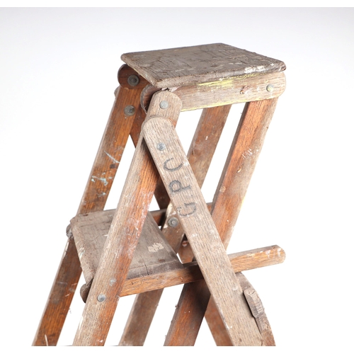 11 - A GPO oak step ladder; together with a rustic barn ladder (2).