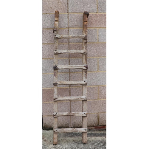 11 - A GPO oak step ladder; together with a rustic barn ladder (2).