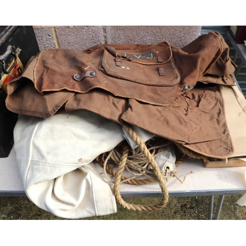 119 - A large quantity of militaria in a tin trunk named to 'M C Barrett' to include hip flasks, canvas ba... 