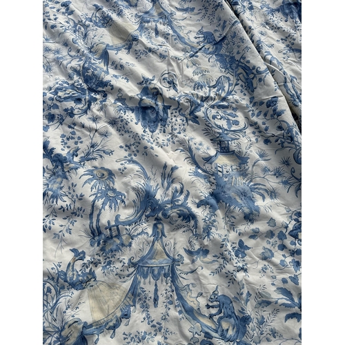 122 - A large single interlined curtain with blue & cream Toile de Jouy pattern and matching pelmets , 207... 