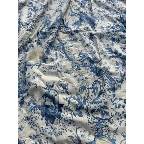 122 - A large single interlined curtain with blue & cream Toile de Jouy pattern and matching pelmets , 207... 