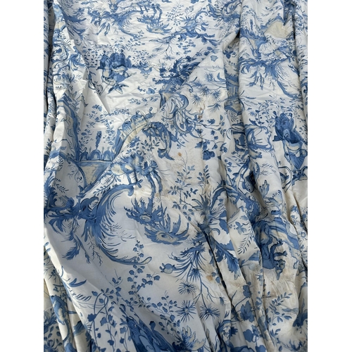 122 - A large single interlined curtain with blue & cream Toile de Jouy pattern and matching pelmets , 207... 