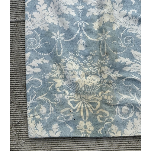 123 - A large pair of blue & cream leaf pattern interlined curtain, 207 by 145cms.