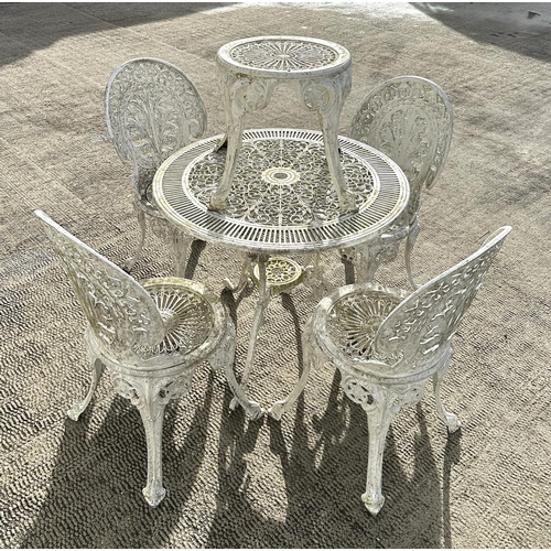 13 - A Coalbrookdale style painted aluminium patio set comprising table, 80cms diameter and four matching... 