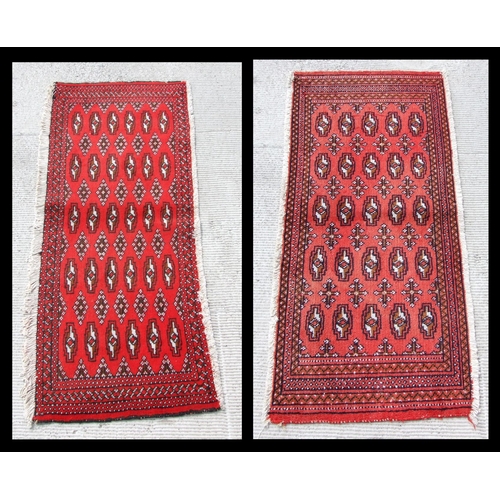 147 - Two small Persian Turkoman woollen hand-made rugs with geometric designs on a red ground, each appro... 