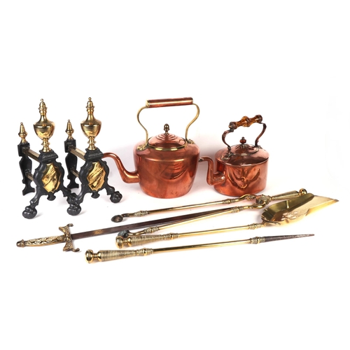 27 - A pair of steel and brass fire dogs; together with a brass coal scuttle; fire irons and copper kettl... 