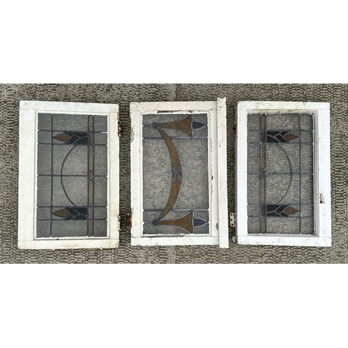 3 - A pair of Art Nouveau design stained glass windows, 40 by 22cms; together with three stained glass w... 