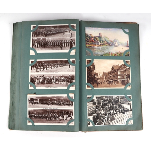 33 - An early 20th century complete postcard album to include topographical, whimsical, military, histori... 