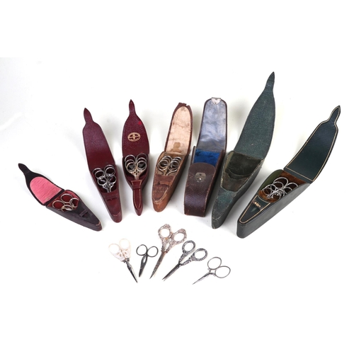 337 - A group of 19th century sewing scissor cases, complete and partially complete; together with loose s... 