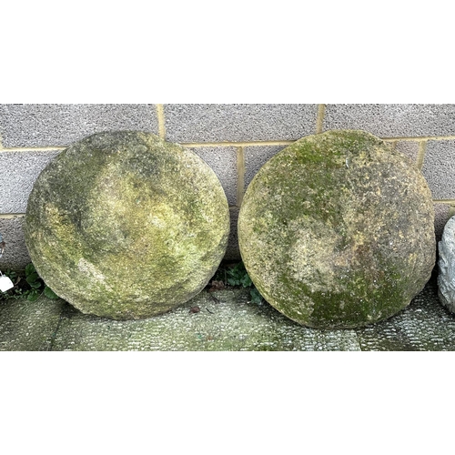 4 - A pair of staddle stone tops, approx 66cms diameter (2).