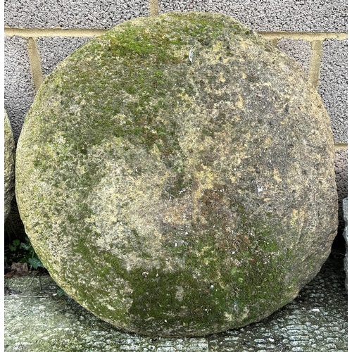 4 - A pair of staddle stone tops, approx 66cms diameter (2).