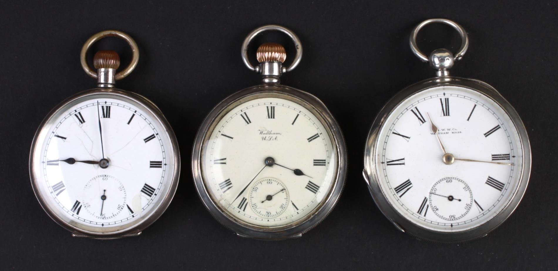 A group of three Military issue open faced pocket watches (3).