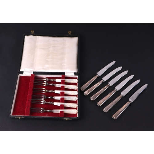 434 - A set of six Edwardian silver mother of pearl handled fruit forks, Sheffield 1904, cased; together w... 