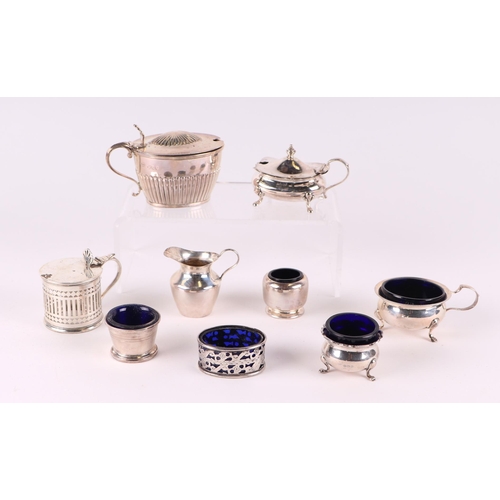 435 - A quantity of silver condiments to include salts, mustard pots and others similar, various dates & m... 