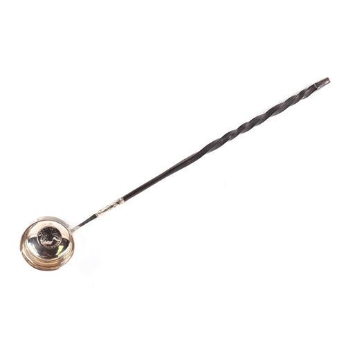 437 - A George I white metal toddy ladle with baleen handle and Queen Anne inset coin, 35cms long.