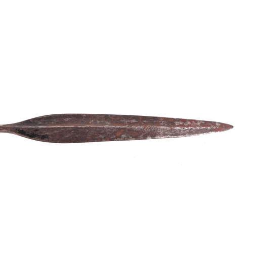 45 - An African Zulu type tribal leaf form steel stabbing spear head with remains of wooden shaft, 73cms ... 