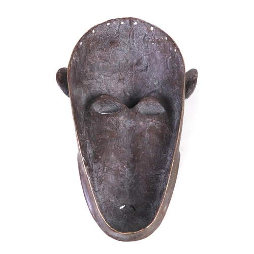 46 - An early 20th century African tribal bronze 'monkey' mask by Lobi People, Burkina Faso, West Africa,... 