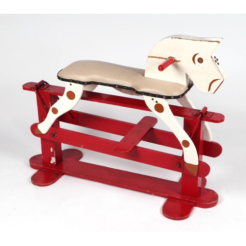 65 - A vintage painted wooden safety rocking horse, approx 100cms long