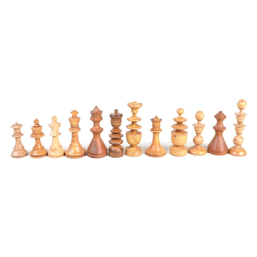 66 - A large quantity of mixed chess pieces to include boxwood examples.