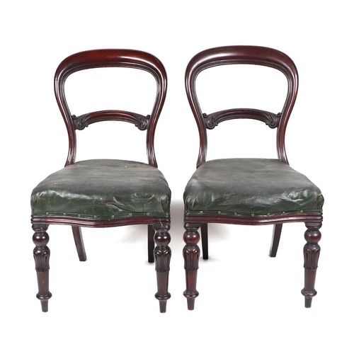 761 - A set of four Victorian mahogany balloon back dining chairs with overstuffed seats and reeded and tu... 