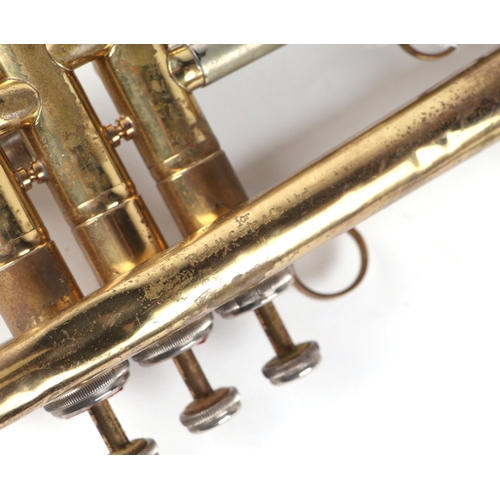 77 - A Rudall Carte & Co. Weltklang brass trumpet.