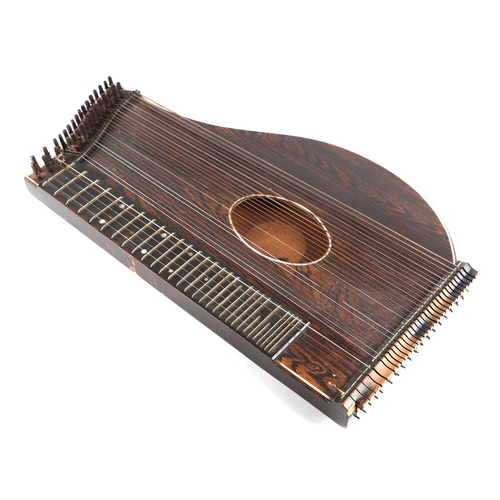 81 - A zither cased.