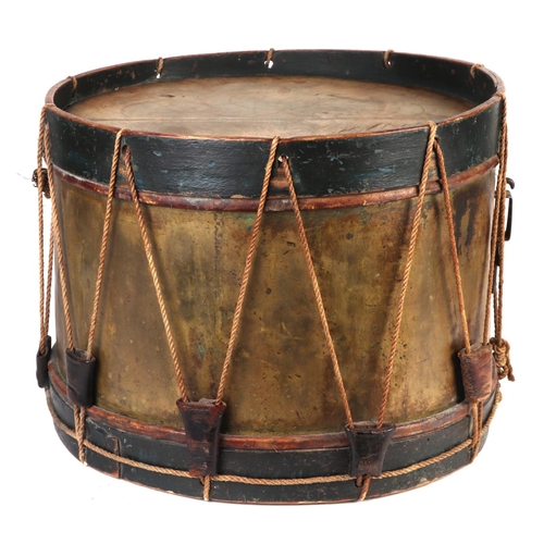 82 - A brass and wooden military marching drum, 40cms diameter.