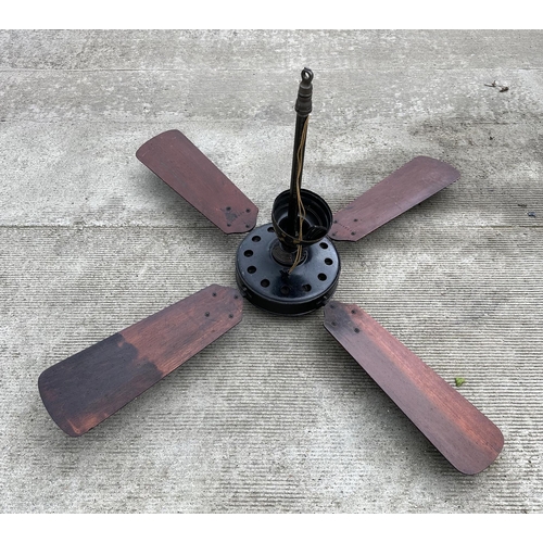 904 - An early 20th century vintage Westinghouse Sidewinder cast iron ceiling fan with two propeller type ... 