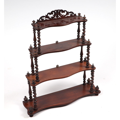 905 - A set of Victorian rosewood graduated shelves on barleytwist supports, 61cms wide.