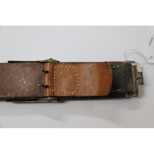 110 - An original WWII German Third Reich Luftwaffe desert uniform leather waist belt and brass buckle, st... 