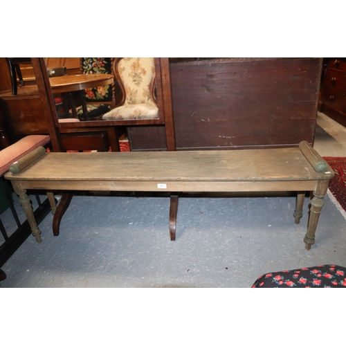 760 - A Victorian oak window seat with tapering reeded and turned legs, with traces of green painted decor... 