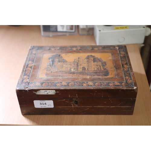 314 - A 19th century Tunbridgeware box of waisted form, the top decorated with a castle, 25cms wide; toget... 