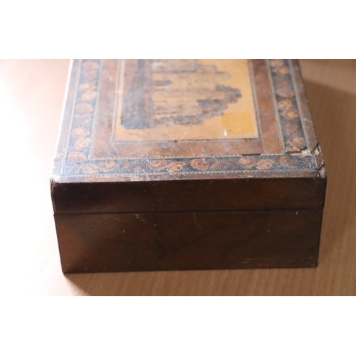 314 - A 19th century Tunbridgeware box of waisted form, the top decorated with a castle, 25cms wide; toget... 