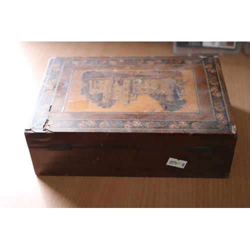 314 - A 19th century Tunbridgeware box of waisted form, the top decorated with a castle, 25cms wide; toget... 