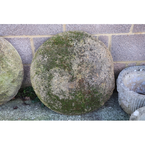 4 - A pair of staddle stone tops, approx 66cms diameter (2).