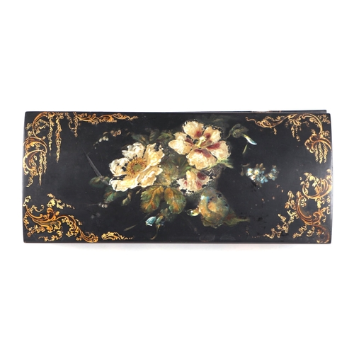 1024 - A 19th century Jennens & Bettridge papier-mâché glove box decorated with flowers and gilt highlights... 