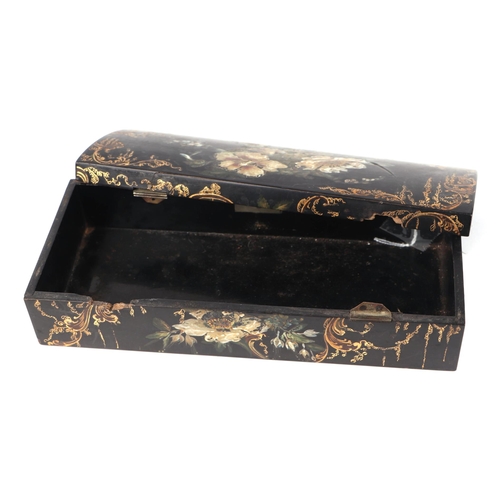 1024 - A 19th century Jennens & Bettridge papier-mâché glove box decorated with flowers and gilt highlights... 