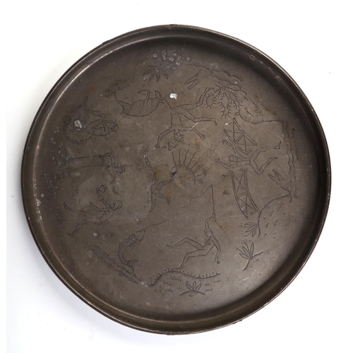 1042 - A Swedish Svenskt Tenn circular pewter tray, with folk art wriggle work decoration depicting figures... 