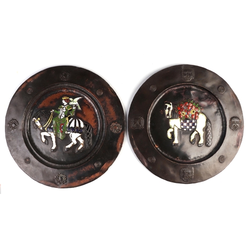 1046 - A pair of late 19th century Russian / Baltic enamel repousse copper dishes, one depicting a woman fa... 