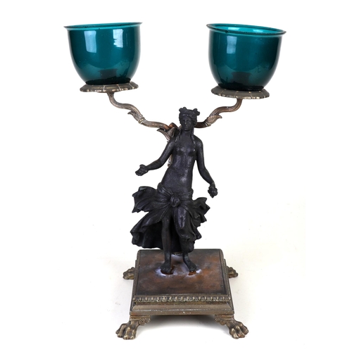 1052 - An Italian Grand Tour style twin arm figural candle stand, 34cm highCondition ReportThe figure has b... 