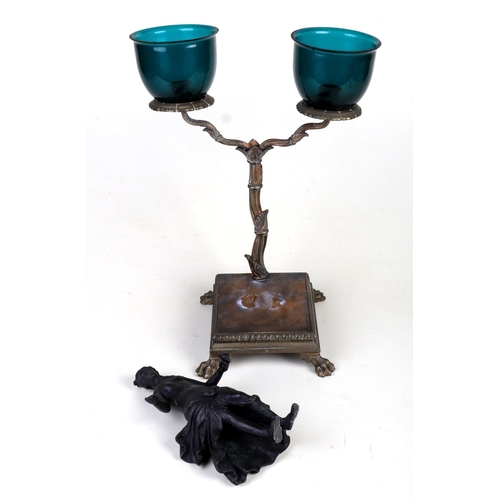 1052 - An Italian Grand Tour style twin arm figural candle stand, 34cm highCondition ReportThe figure has b... 