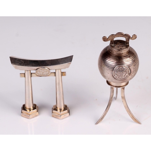 1136 - A pair of Japanese silver salt shakers in the form of a paper lantern and a Torii gate, largest 9cm ... 