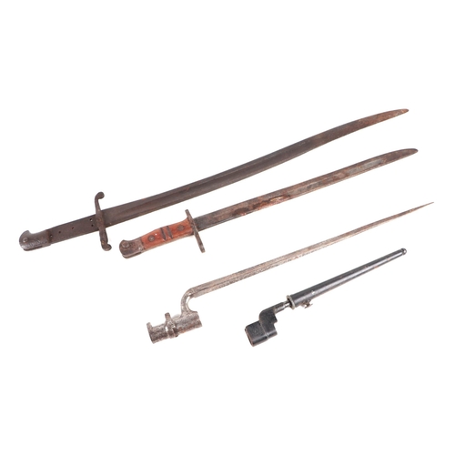 123 - A WWI bayonet with wooden handle; together with another bayonet; two spike bayonets. (4)..