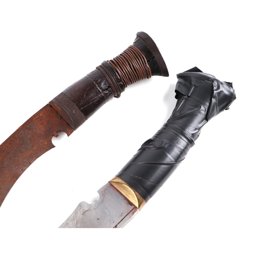 130 - A Kukri with leather scabbard, 42cms long; together with another similar (2).