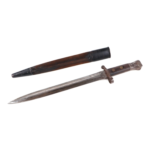 134 - A WWI bayonet with 30cms steel blade, signed 'Wilkinson London', with metal and leather scabbard.