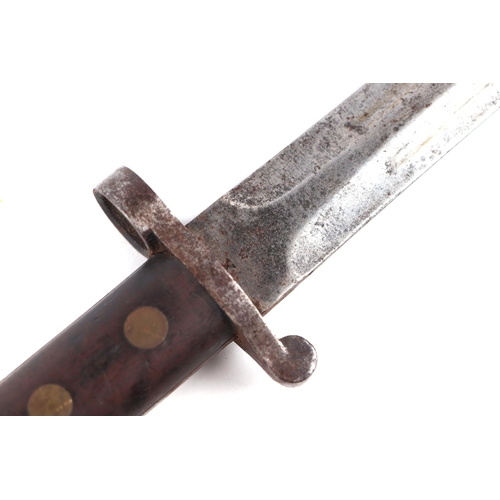 134 - A WWI bayonet with 30cms steel blade, signed 'Wilkinson London', with metal and leather scabbard.