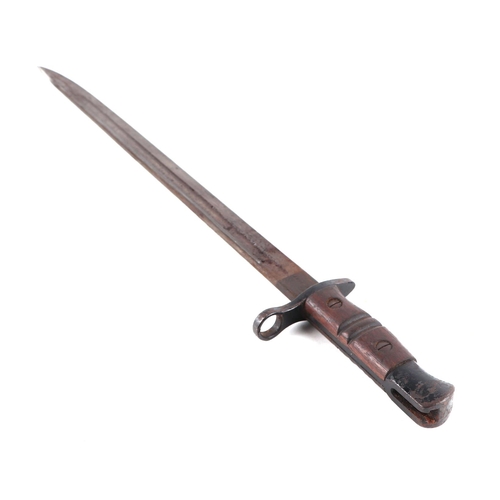 135 - A WWI K bayonet with 42cms long double fuller steel blade with metal and leather scabbard.