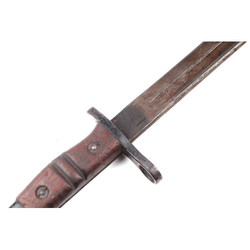 135 - A WWI K bayonet with 42cms long double fuller steel blade with metal and leather scabbard.