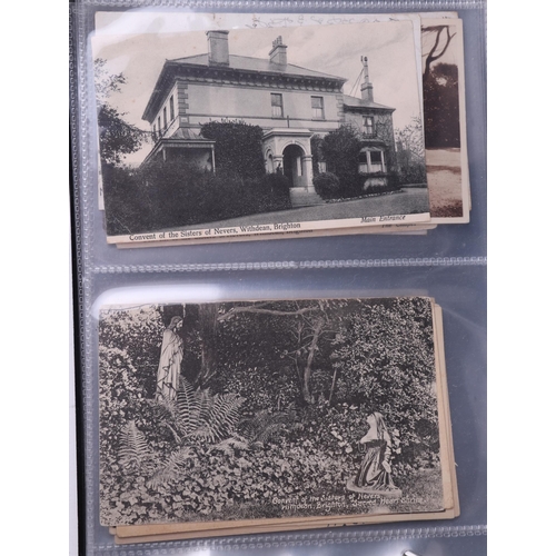 1381 - A large collection of antique and vintage Preston Park and Brighton interest postcards contained in ... 